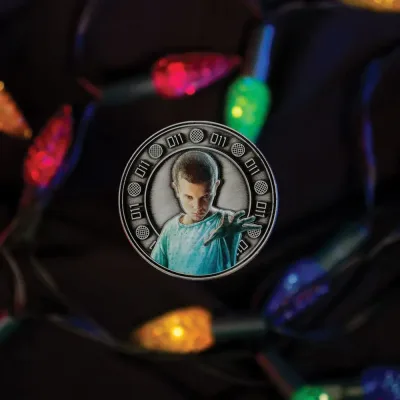 Stranger Things Eleven and Hopper Coin